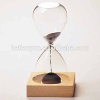 Magnetic sand timer with wood base